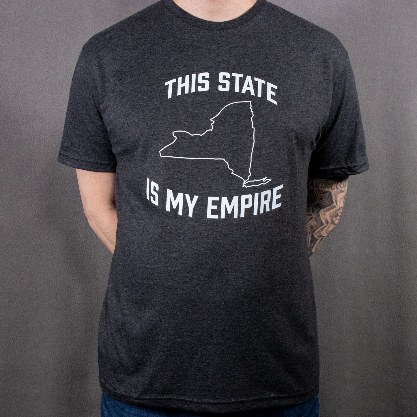 Dark Heather "This State Is My Empire" on a Softstyle, Short Sleeved Tee